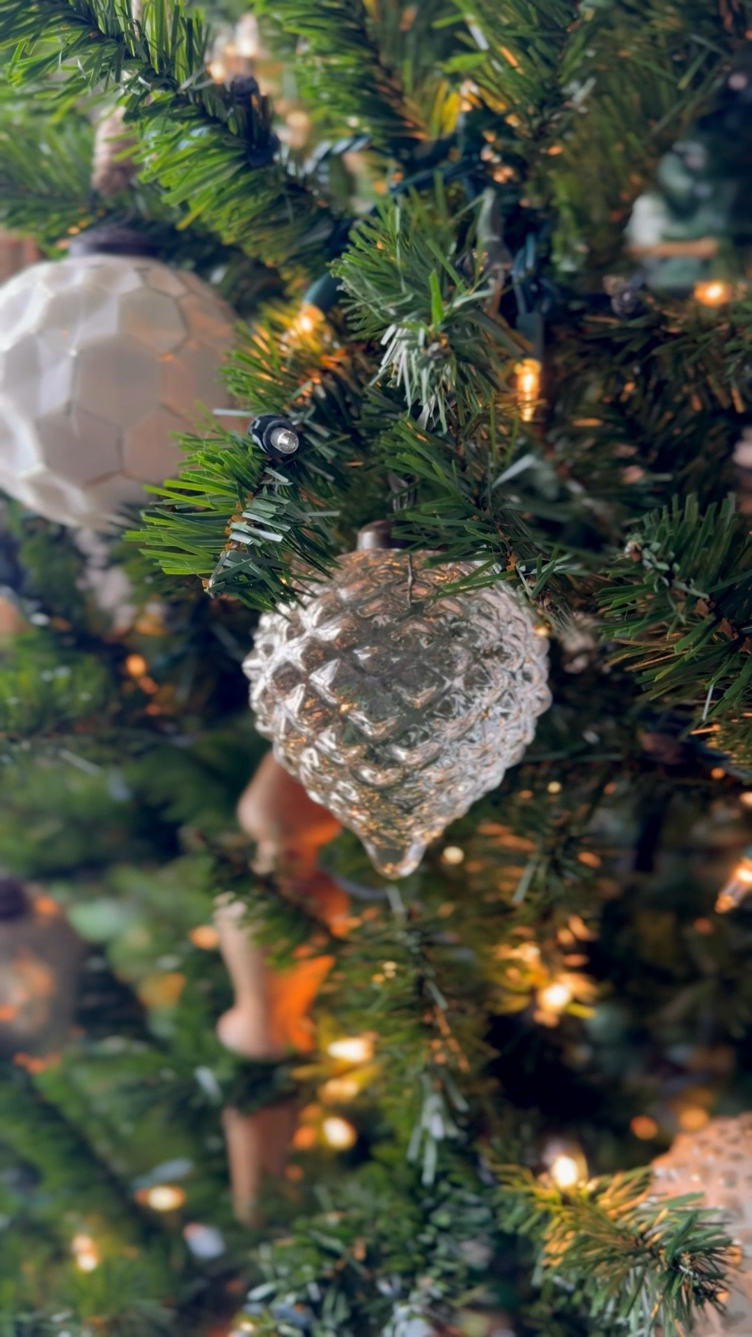 This tree is all about softness, texture, and timeless elegance. I styled it with a blend of neutral wood and clear glass ornaments for a look that feels airy, cozy, and beautifully curated. The warm wood tones add an organic, earthy element, while the glass pieces catch the lights and add that subtle, magical sparkle — without overwhelming the space.

This combination is perfect if you love a refined, neutral holiday aesthetic that works with modern farmhouse, minimalist, Scandinavian, or transitional home styles. It instantly elevates your Christmas tree with a calm, luxury feel and is incredibly easy to style from year to year.

These ornaments pair beautifully with linen ribbon, neutral stockings, soft twinkle lights, and simple wrapping paper for a cohesive, Pinterest-worthy Christmas setup. Whether you’re refreshing your own tree or looking for the perfect thoughtful gift, this set is a staple you’ll reach for every holiday season.

Neutral Christmas • Neutral Holiday Decor • Neutral Tree • Christmas Tree Decor • Modern Farmhouse Christmas • Minimalist Holiday • Glass Ornaments • Wood Ornaments • Natural Decor • Simple Christmas • Elegant Christmas Decor • Holiday Home Inspo • Christmas Decor Inspo • Holiday Must Haves • Home Decor Trends • Cozy Christmas Vibes • Winter Home • Decor Inspo • Target Home • Neutral Home Style • Seasonal Decor

#LTKHome #LTKHoliday #LTKSeasonal