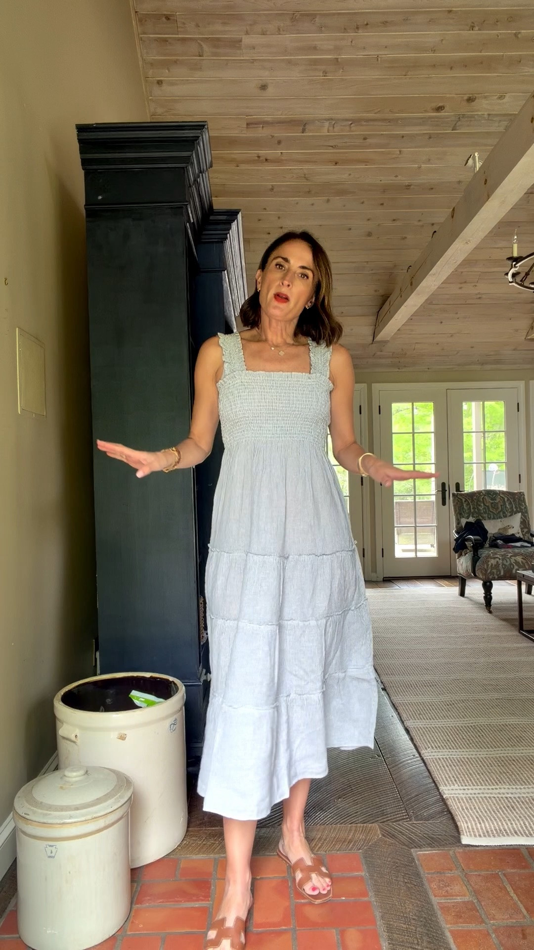 This dress from @Quince is the perfect summer dress and so easy to wear. I love adding a striped sweater over my shoulders and my hoops are 14 carat gold and priced so well. #quincepartner