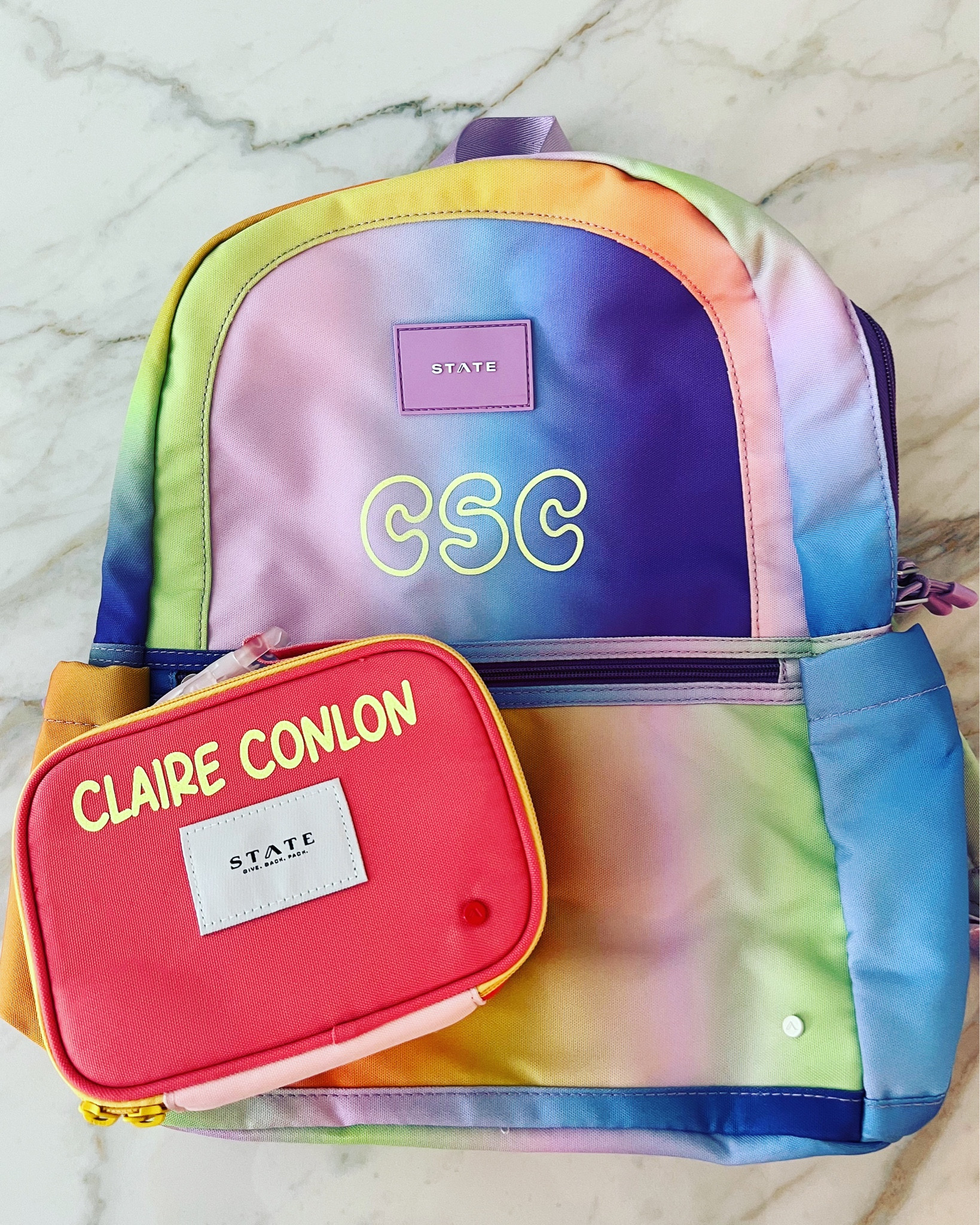 Waiting on our @statebags lunch boxes but this tennis ball 🎾 colored vinyl has become one of my favorites! Such a fun pop of color!! All linked on MC, or comment for links! 

#LTKBacktoSchool #LTKitbag #LTKkids