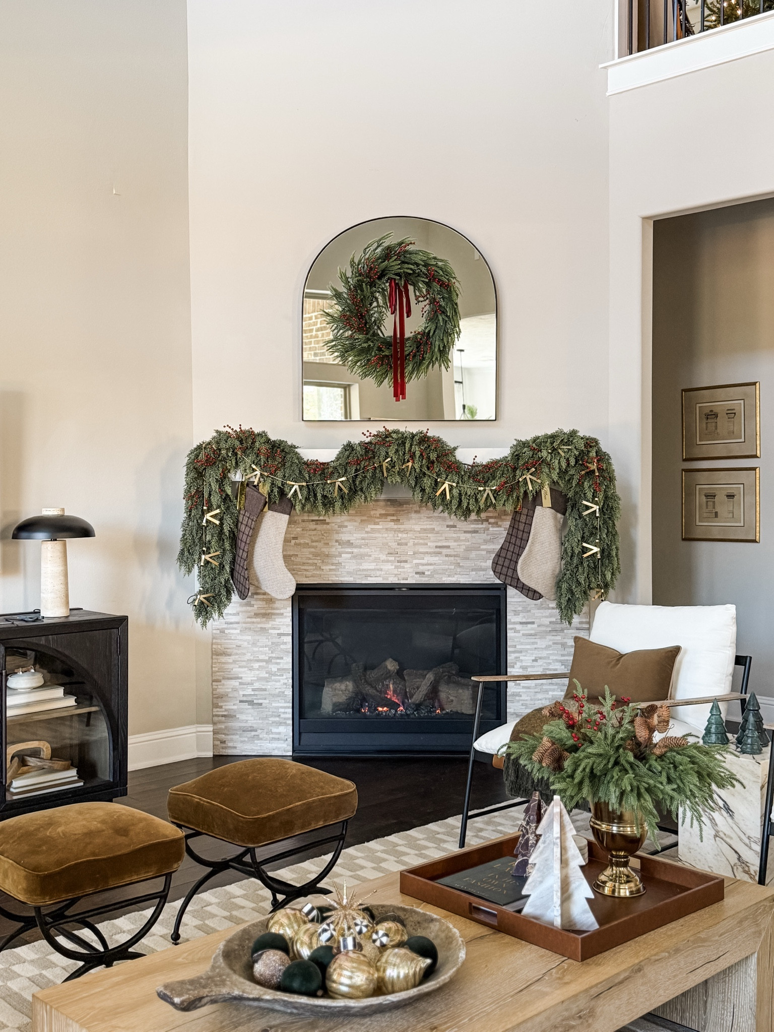 holiday mantel decor, Christmas mantel ideas, holiday home styling, red and burgundy decor, gold garland, velvet bow wreath, affordable holiday decor, realistic garland, neutral Christmas decor, festive mantel inspiration, classic holiday look, cozy holiday home, mantel styling tips

#LTKHome #LTKSeasonal #LTKHoliday
