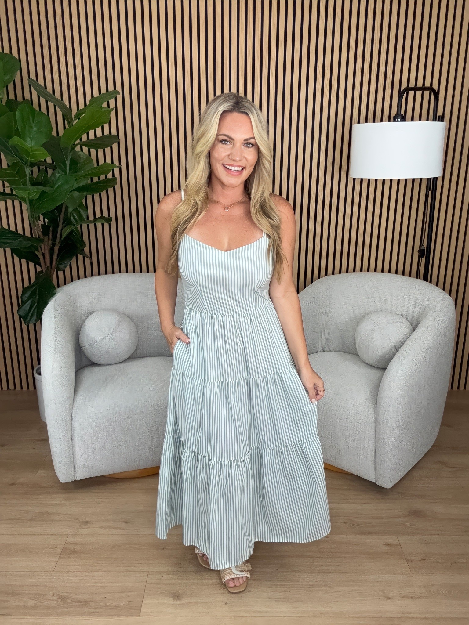 The soft blue stripes and full tiered skirt make this maxi such a beautiful end of summer dress. I love the movement through the skirt and the simple neckline that lets you add your favorite jewelry.

blue maxi dress, striped dress, tiered dress, end of summer style, vacation dress, feminine outfit, maxi dress style, summer occasion dress, blue and white dress, transitional style, AudrieDollins

#LTKSeasonal #LTKOver40 #LTKootd