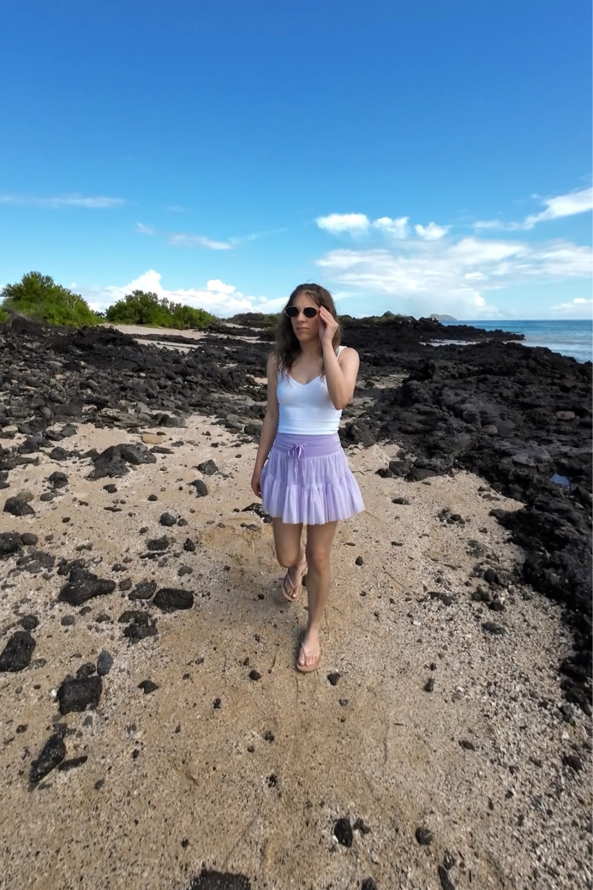 Lululemon Active top and popflex skirt for hiking in the Galapagos- with Archie’s arch support flip flops