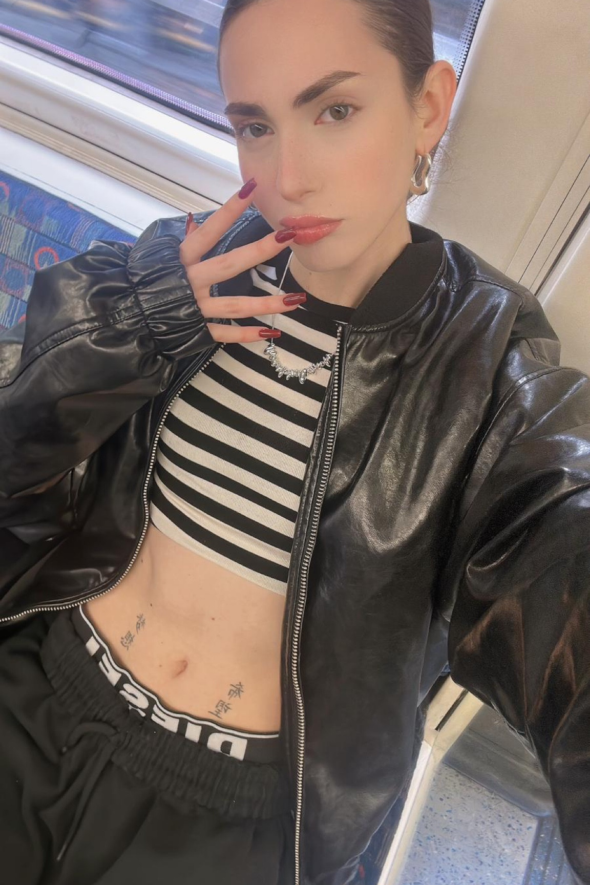 Silver chunky jewellery, silver necklace, structured hoop earrings, striped crop top, fitted tee, leather look bomber jacket, pull and bear, cos

#LTKstyletip #LTKeurope #LTKSeasonal