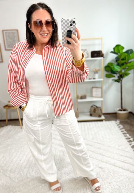 New arrivals from Walmart!  Cropped button down top!  Love these orange stripes!  Wearing a large. New utility style pants. Size xl in mine. I have some extra room in these, so could possibly do a large for a less oversized look. Sandals fit tts and are very comfortable !

#LTKSeasonal #LTKmidsize #LTKfindsunder50