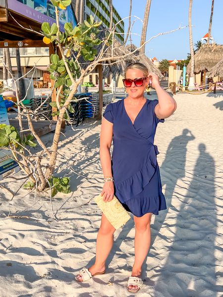 Easy blue Amazon dress for summer outfits! Love the wrap dress style and ruffle hem! 

Short dress, wrap dress, sandals, beach outfit, summer outfit, straw clutch, Amazon dress, Amazon fashion, Amazon bag

#LTKFindsUnder50 #LTKSeasonal #LTKOver40