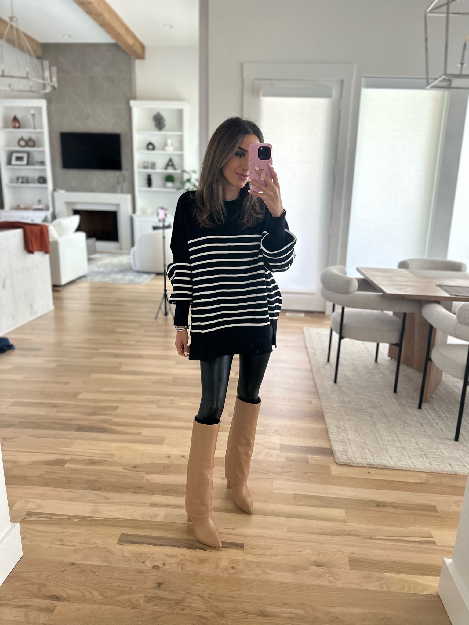 Amazon stripe tunic sweater smallest size, faux leather leggings size xs petite boots size 7 
Fall outfit idea 

#LTKFallSale #LTKFindsUnder100 #LTKFindsUnder50