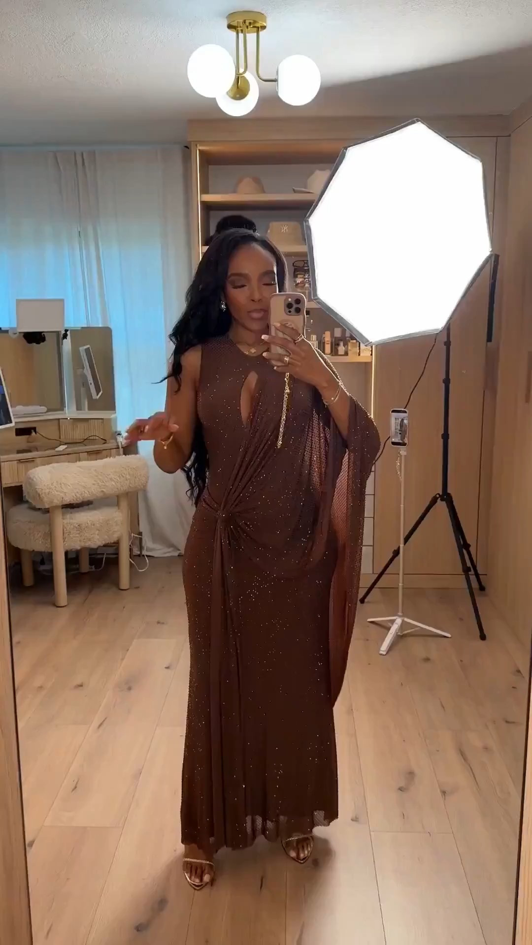 meshki brown sparkle gown — a draped, embellished silhouette that feels effortlessly elegant. The keyhole detail and wrap-style draping create a statuesque shape that photographs beautifully and feels so elevated without trying too hard.

Perfect for winter galas, holiday parties, and formal evenings when you want a true statement moment.

📏 Sizing: Small
📏 Measurements: 5’4” • 138 lbs • 34D • 27” waist • 40” hips

meshki gown outfit ideas, brown holiday dress inspo, winter formal looks, elegant evening style, glamorous special-occasion outfits, embellished evening gown, draped maxi dress

✨ everything linked below for easy shopping

follow me on instagram and youtube @kirasfashionfinds

#LTKHoliday #LTKootd #LTKPetite