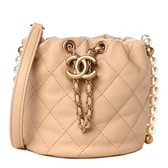 CHANEL

Calfskin Quilted Pearl Mini About Pearls Drawstring Bucket Bag Beige | Fashionphile
