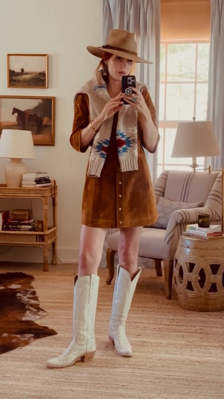 Suede is trending for the fall and this Hunter Bell mini dress is a great staple/layering piece if you’re looking to add to your wardrobe. I styled this look with creamy tones and soft layers. My boots pair back with the stitching on the dress and ties in with the sweater that I draped over my shoulders. I added the hat for more dimension (such cute details added to it!).

#LTKStyleTip #LTKSeasonal #LTKVideo