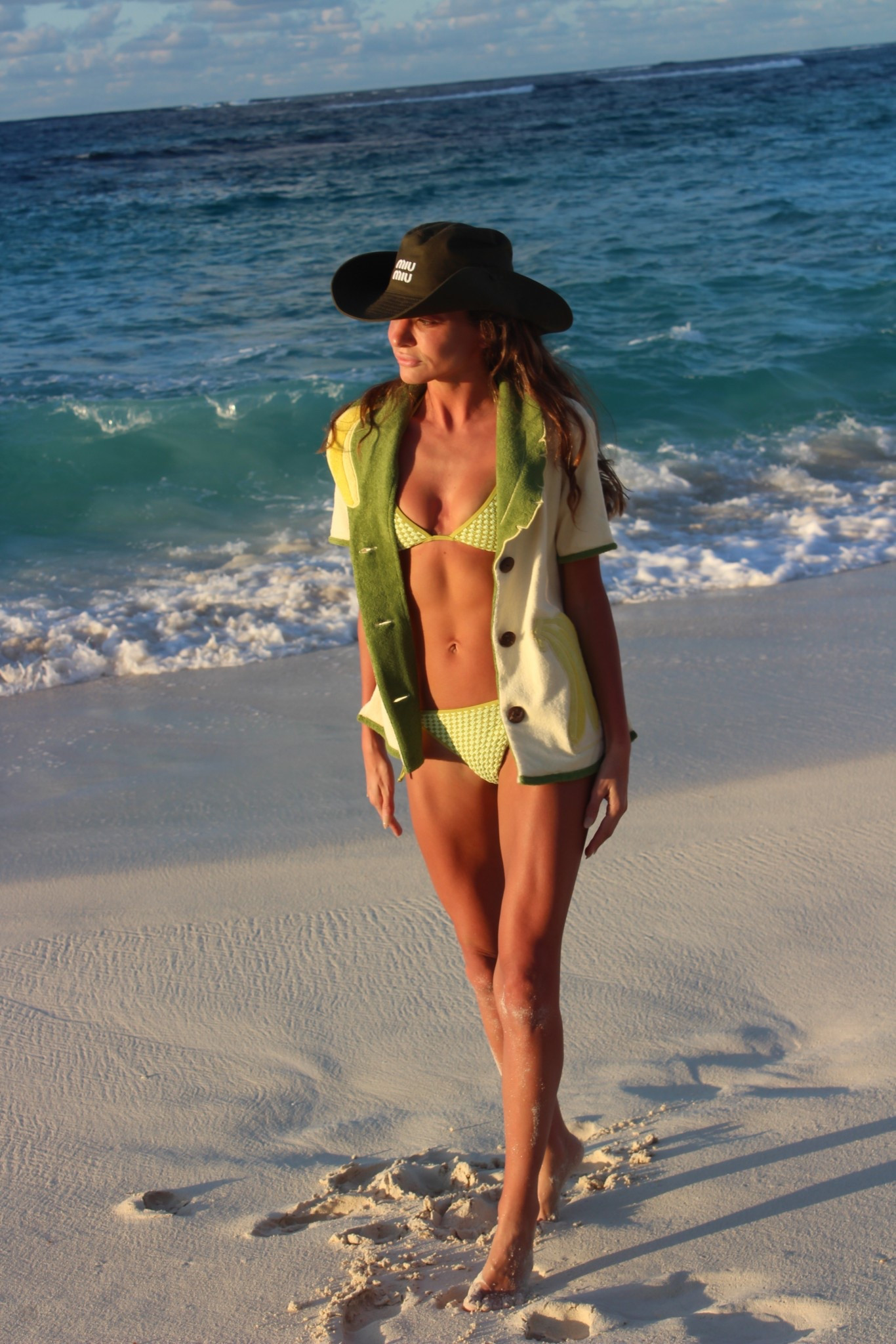 classic halter triangle bikini perfect for minimal tan lines. This chic silhouette ties at the neck and back in a woven design

#LTKSwim #LTKStyleTip #LTKTravel