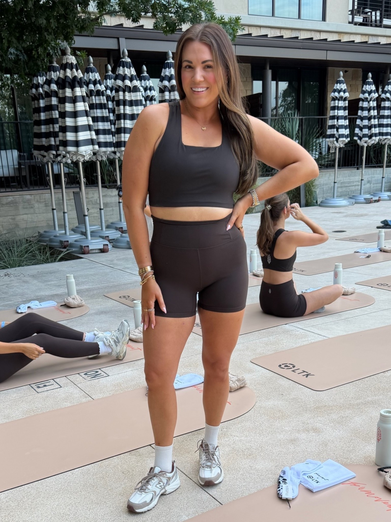 curvy midsize workout look! wearing size medium in white tee, size large in brown sports bra, and size large in shorts (could have sized down in shorts)

#LTKCon #LTKActive #LTKMidsize