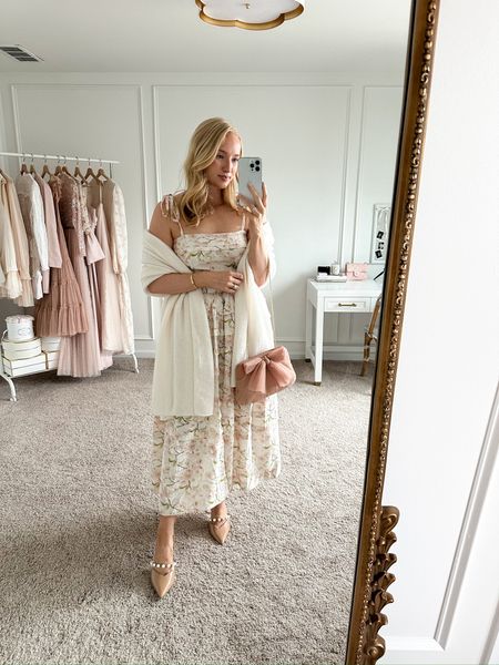 Love this tiered floral midi for spring. This would be a great option for Easter or a dressy event. Pair it with heels from Amazon and bag for a pop of color and a cashmere shall  

#LTKstyletip #LTKparties #LTKSeasonal