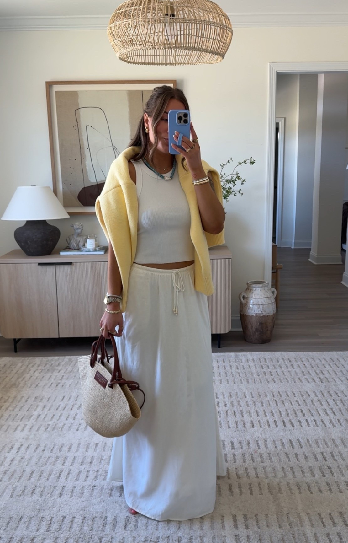 Wearing a small in both the top and the skirt. Skirt runs large.

Spring outfit. Summer outfit. White maxi skirt. Euro summer outfit. Sezane
Bag

#LTKootd