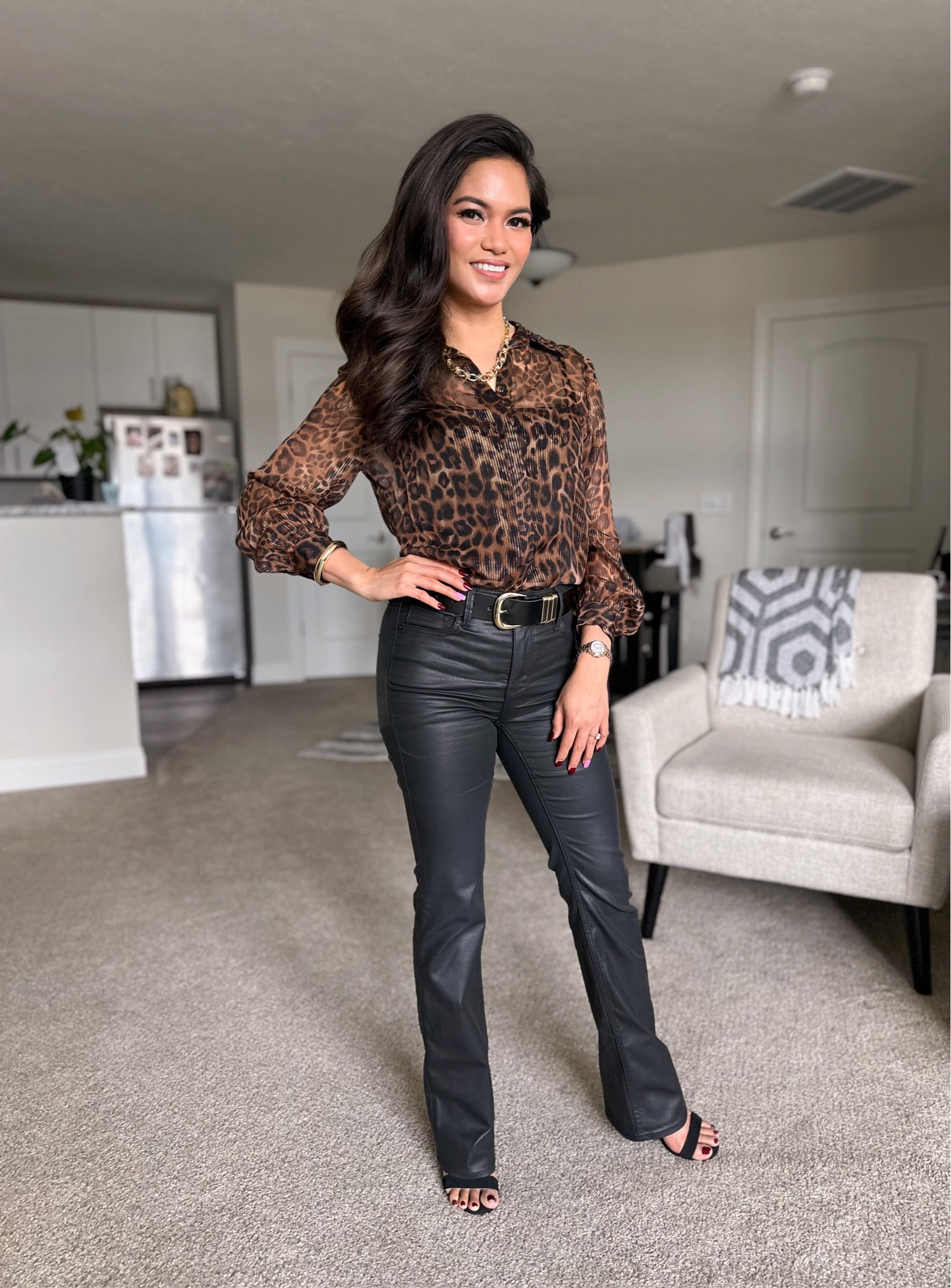 Attractive outfit for the office or a Friday date night. 
Leopard print shirt is from White House Black Market.  I’m wearing size 0 Petite.  Fit is TTS.  
Black coated high rise bootcut jeans are size 0 Petite.  
#whbm

#LTKWorkwear #LTKFindsUnder100 #LTKStyleTip