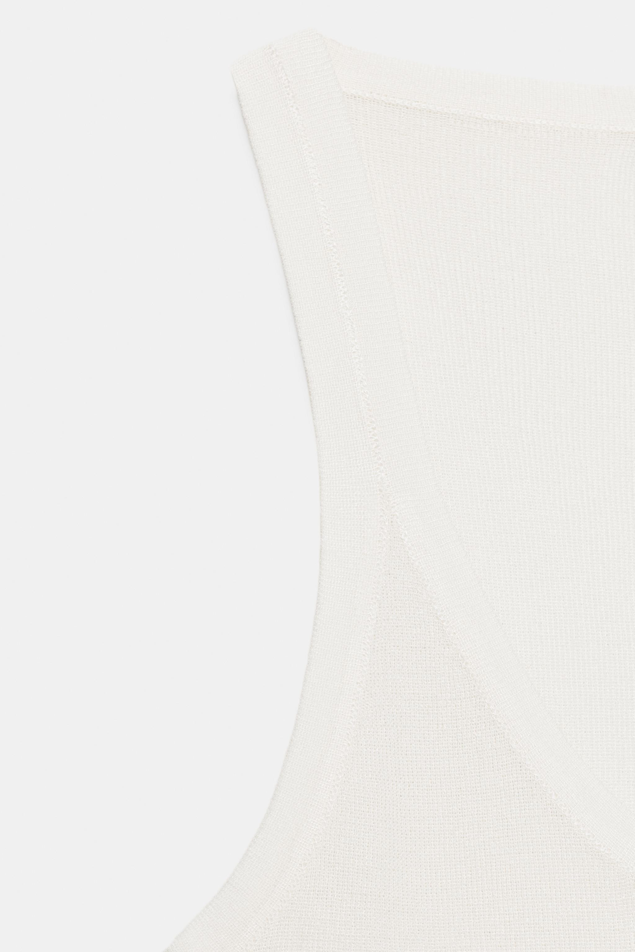 Fine-knit top with a round neckline and sleeveless design. | Zara UK