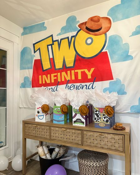 Giant Amazon banner + goodie bags, I’m linking everything we added to the bags! 

Toy Story theme, Toy Story party, two infinity and beyond, second birthday party 

#LTKkids