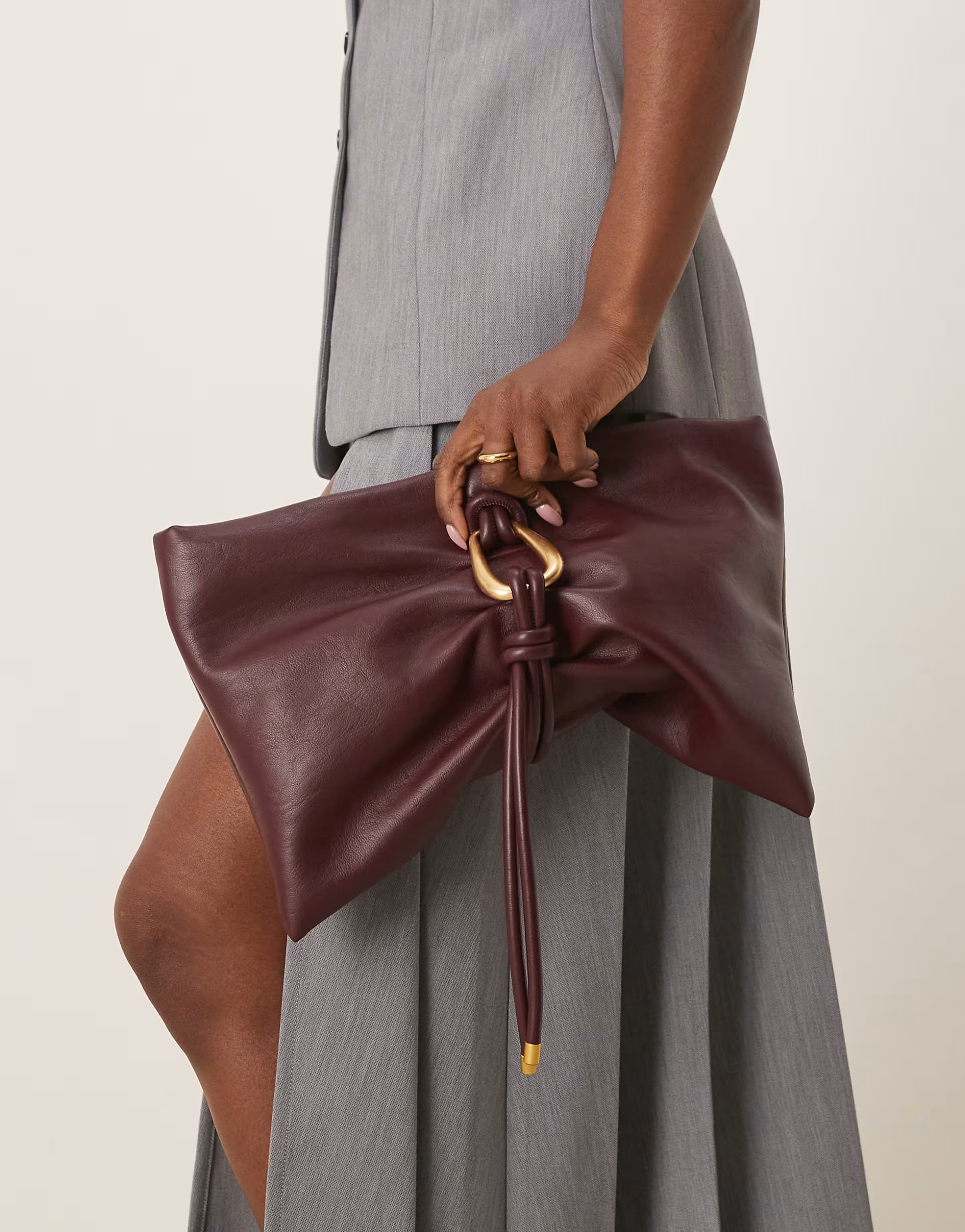 ASOS DESIGN hardware detail wrap flap clutch bag in burgundy | ASOS (Global)