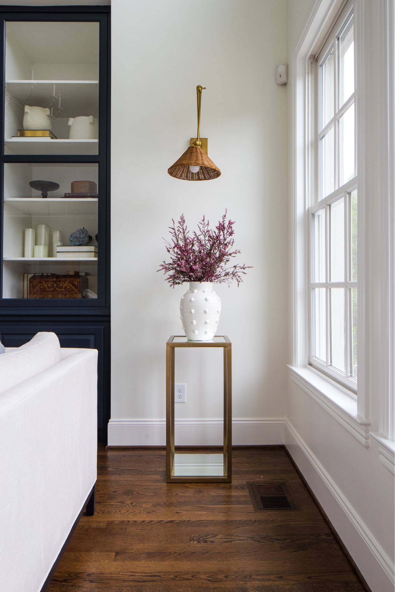 This white vase is a classic. I use it to style so many different styles of houses. It works with every season and always looks fresh. Paired with a unique light fixture like this wicker sconce, it’s a look I’m loving right now.

#LTKhome #LTKunder100 #LTKstyletip