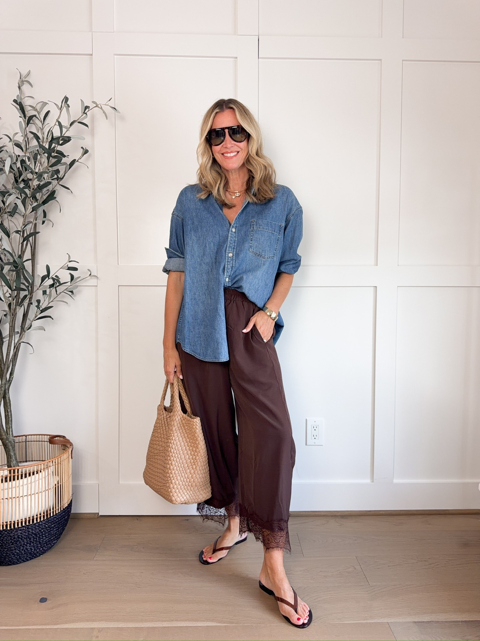 Denim and satin might be my favorite mix for early fall. The casual long sleeve button up balances the brown lace trim pants so well, and the richer color palette feels like fall without requiring a single heavy layer.

denim button up shirt, brown satin pants, lace trim pants, transitional fall outfit, early fall fashion, summer to fall outfit, denim shirt outfit, satin pants outfit, casual fall style, fall outfit inspiration, women’s fall fashion, hauteandhumid

#LTKootd #LTKgrwm #LTKSeasonal