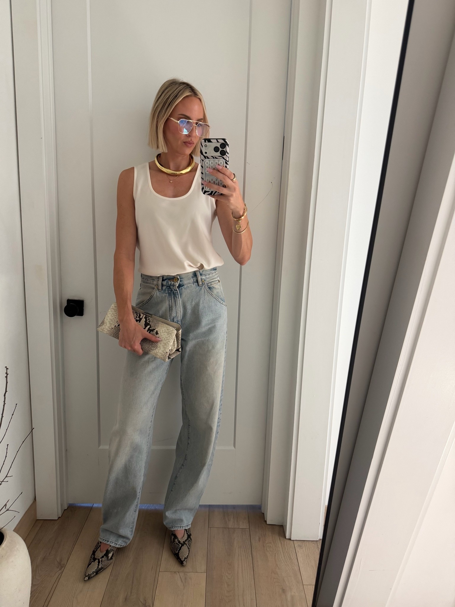 This satin tank was my number one seller last month. It’s such a great price, doesn’t show your bra, is not clingy, looks expensive and is a great layering piece. Comes in black too

#LTKOver40 #LTKWorkwear #LTKdayinmylife