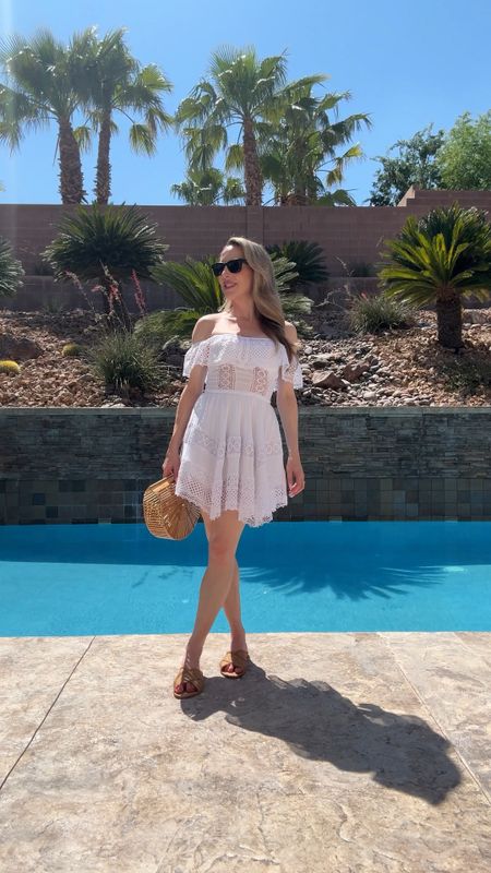 Summer vacation outfit idea : white off the shoulder broderie anglaise dress, tan slide sandals, bamboo clutch bag and Ray-Ban Wayfarer smart glasses for capturing content and memories all day long ☀️ 

#LTKSeasonal #LTKVideo #LTKTravel