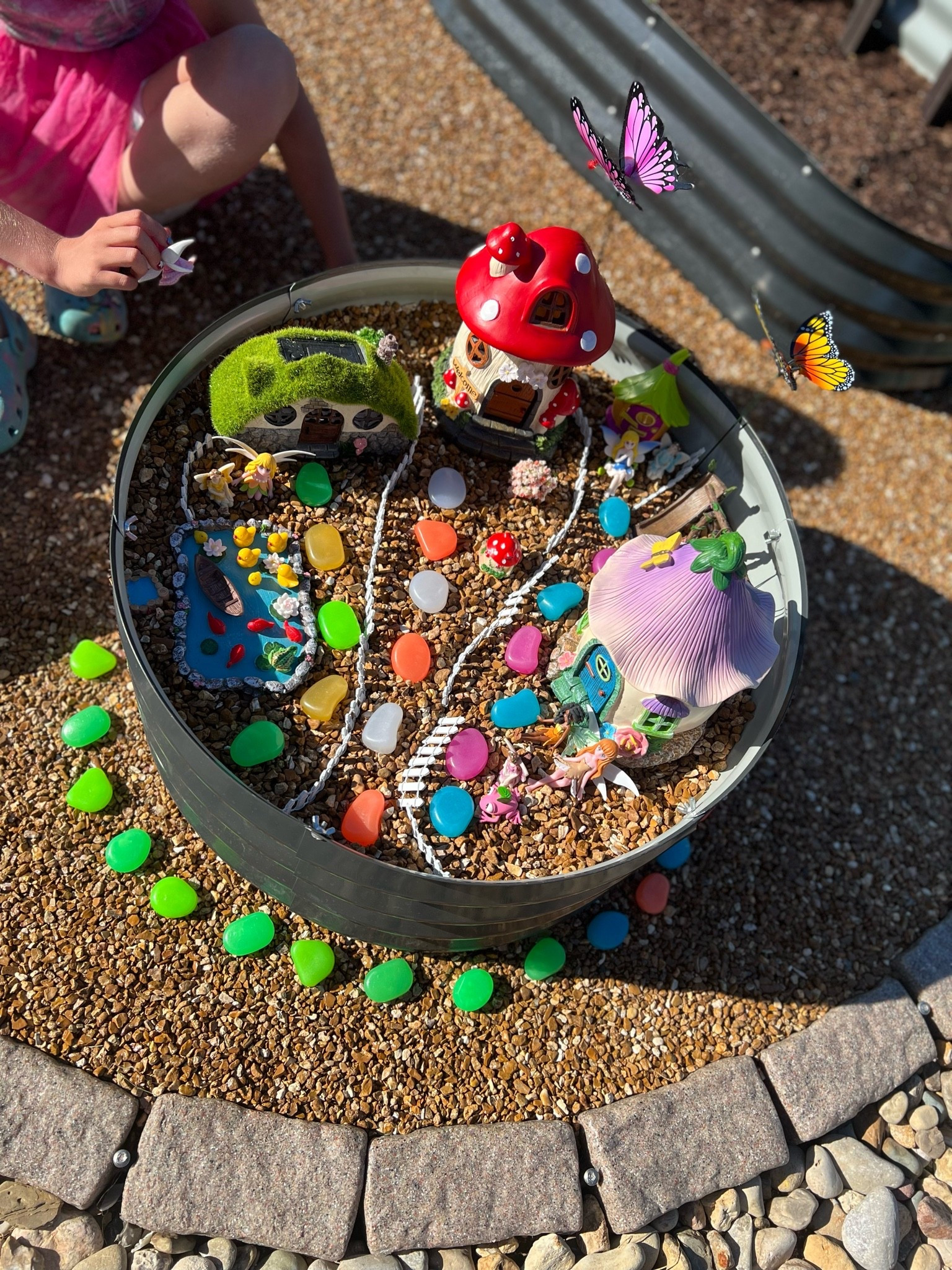 Finally gave in to the kids begging me for a Fairy Garden, so here’s the final product and everything we used — the bright stones + fairy houses are all solar powered/sat charged and glow at night 🥰🥰

#LTKmomlife #LTKKids #LTKdayinmylife