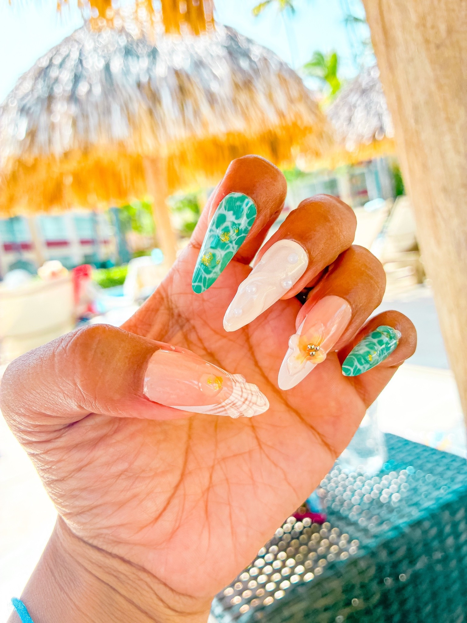 Vacation nails loading ☀️🌊

These almond-shaped press-on nails are giving full ocean energy — seashell details, water drip accents, soft wave patterns, and sandy tones on every nail. Each one is a little different and together they feel like the perfect beach set.

If you don’t have time for a full manicure before your trip, these are such an easy way to still have detailed, vacation-ready nails without the salon visit 🤍

Shop my press-on nails on LTK 🛍️ 

#LTKBeauty #VacationNails #PressOnNails #NailInspo #BeachAesthetic

#LTKTravel #LTKSwim #LTKBeauty