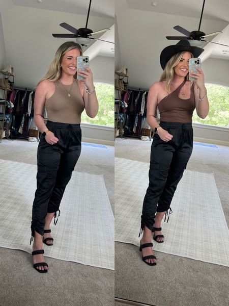 Fave skims lookalike bodysuit on the left. Buttery soft & quality is 10/10. TTS - M 
Satin pants so comfy & stretchy waist. TTS - M. 
Brown cutout one shoulder bodysuit on right so comfy & stretchy. Sized up 1 to the L 
Black cowboy hat perfect for Nashville or country concert. 🤠
Fave black heels TTS & so comfy. 🖤

Bachelorette party girls night out Nashville outfit cowboy hat cowboy boots western outfit silk pants joggers amazon outfits skims dupe braided heels western hat 


#LTKFestival #LTKFind #LTKunder50