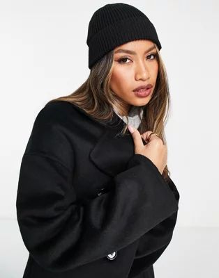 ASOS DESIGN fisherman rib beanie hat in recycled polyester in black | ASOS (Global)