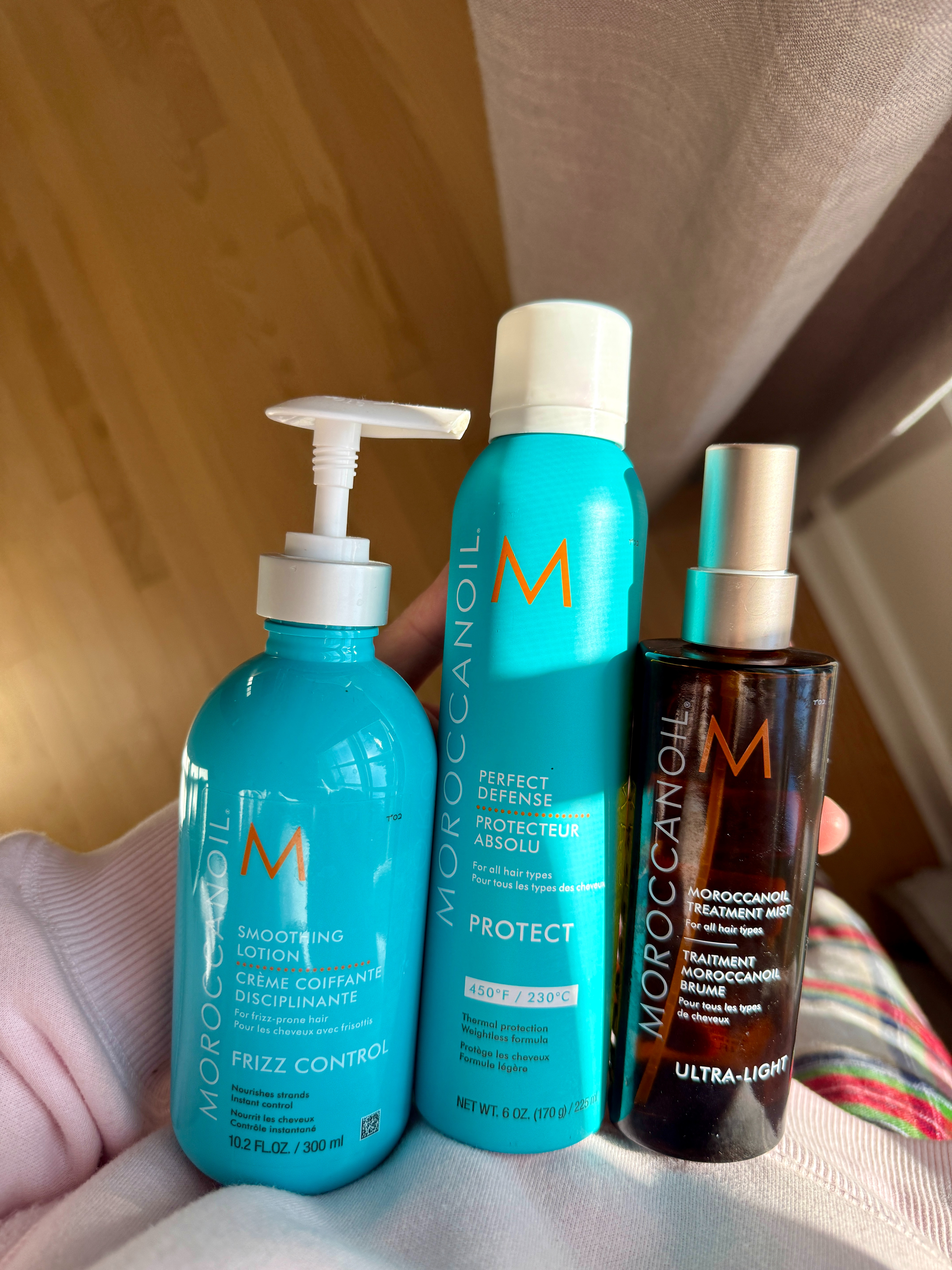 My go-to Moroccan Oil trio for smooth, healthy hair 🤎

These are the products I always reach for when I want my hair to look polished, frizz-free, and protected:

• Moroccanoil Smoothing Lotion – softens hair, controls frizz, and makes styling so much easier
• Moroccanoil Treatment Mist – lightweight nourishment + shine without weighing hair down
• Moroccanoil Defense Heat Protectant – essential protection before blow-drying or heat styling

Together, they keep my hair smooth, shiny, and healthy while protecting it from damage. Perfect for everyday styling and especially great if you use heat tools regularly.

✨ How I use them: lotion + mist on damp hair, heat protectant before styling, and done. 

 #LTKgrwm #LTKselfcare #LTKBeauty