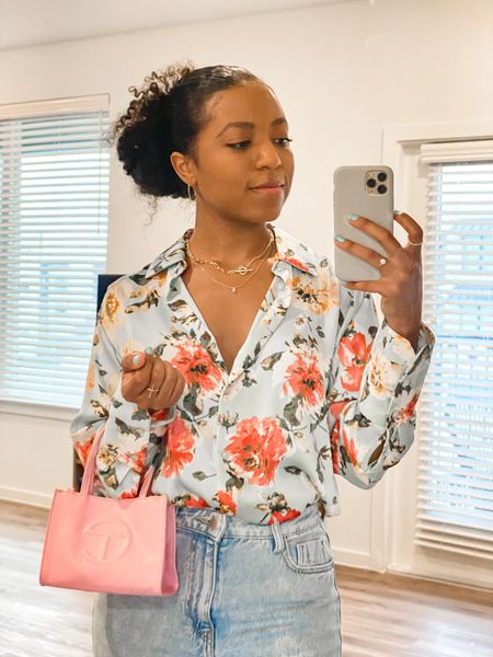Obsessed with this silk floral blouse from Zara. Paired it with a pink Telfar bag to create a softer look. Shop some of my favorite printed tops below to create a colorful spring outfit. 