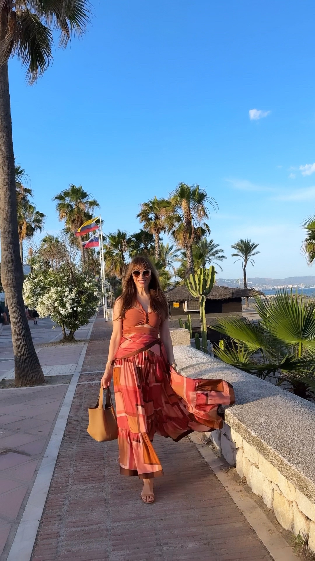 Vacation edition. The skirt is made from 100% silk. It’s flowy and I love how it moves when I walk. It fits true to size, I’m wearing size 1.

#LTKSeasonal #LTKOver40 #LTKSwim