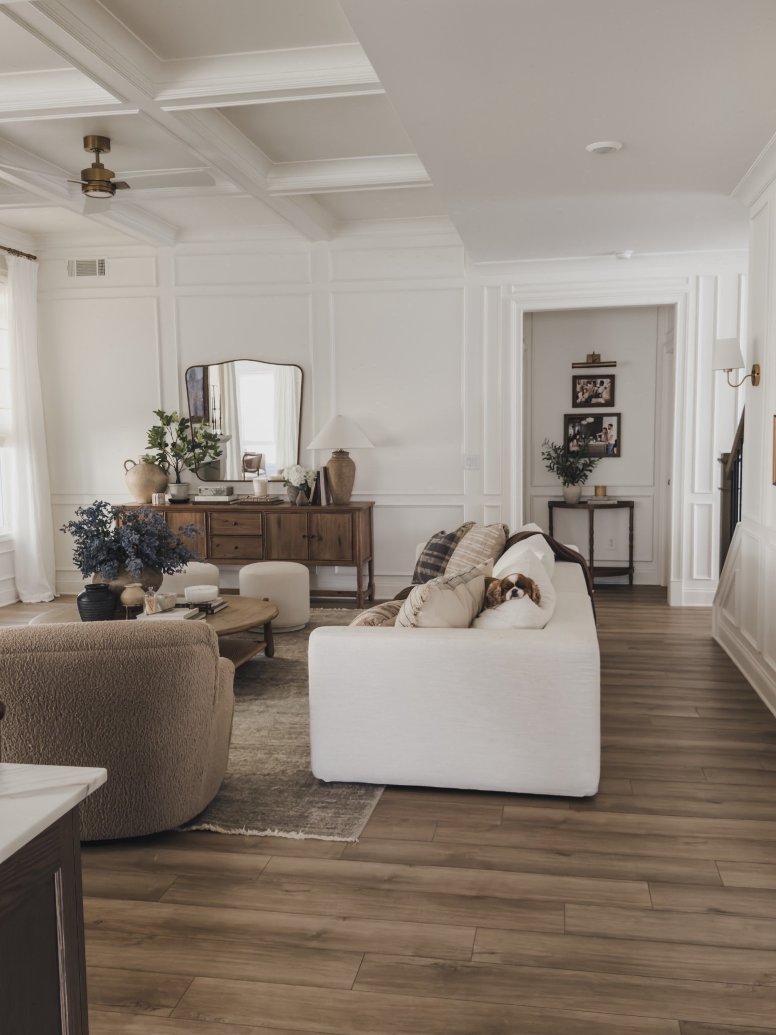 Spring living room refresh with a focus on quality over quantity! 

I started with a simple floral swap — these wild berry, plum, and soft blue stems bring in just enough color while still feeling calm and collected. It’s always the easiest way to shift a space for a new season without changing the foundation.

I also added a new table lamp with the prettiest texture and neutral tones. Lighting is one of those pieces that instantly elevates a room, and this one feels timeless.

A few forever favorites in this space. My neutral rug from the Molly collection. It gives that vintage look I love but is incredibly durable for real life. And my sofa is actually a sectional (I just have the extra pieces stored away right now), which I love for the flexibility. The best part.. all of the covers are 100% washable, which makes it feel as practical as it is beautiful.

It’s the mix of intentional, quality pieces with small seasonal updates that keeps a space feeling fresh without starting over.

#LTKSeasonal #LTKHome #LTKSaleAlert