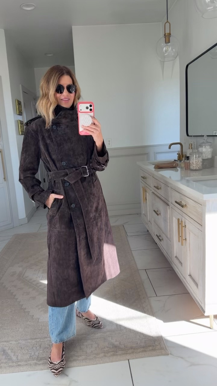 Wearing a size small in the slouchy leather trench currently on sale in the Whiskey color