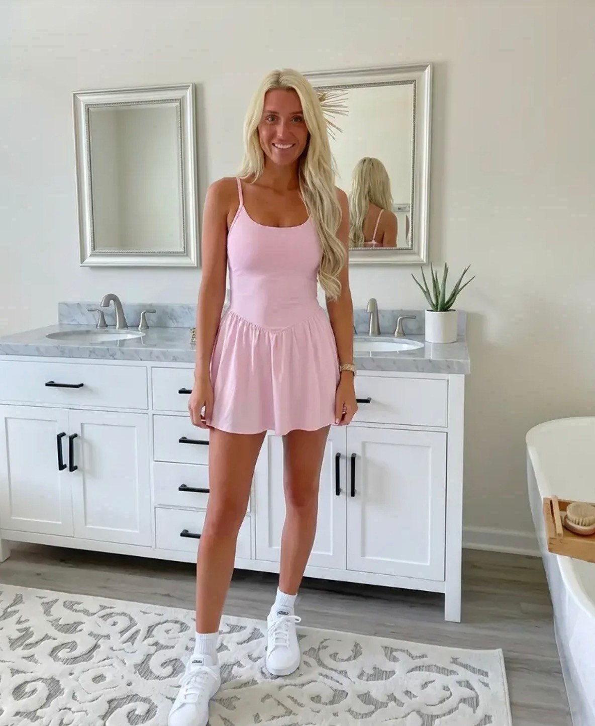 
Bright, lifestyle influencer selfie in a minimalist dressing room mirror. A stylish blonde woman with long beachy waves wears a green and white striped sleeveless polo dress paired with white Adidas sneakers and gold bracelets. The look is sporty-chic and effortless. Neutral dressing room background with soft lighting, clean wood floors, and a relaxed summer vibe. The aesthetic is preppy, travel-ready, and Instagram-worthy — Ralph Lauren meets casual golf resort style. The mood is confident, playful, and polished.

⸻

Caption

Sporty, comfy, and ready for wherever the day goes ✨
This is my favorite kind of outfit — easy, travel-ready, and cute enough for anything from running errands to grabbing lunch or hopping on a flight.

Athleisure but make it preppy chic 💚

— Heidi

⸻

Hashtags

#trendyheidi
#trendywithapassport
#sportychic
#athleisurestyle
#preppystyle
#summeroutfits
#everydaystyle
#adidasstyle
#casualchic
#airportoutfit
#weekendstyle
#tenniscore
#golfstyle
#traveloutfit
#effortlessstyle
#womenwithstyle
#styleinspo
#outfitinspo
#ootdfashion
#everydayfashion
#influencerstyle
#lookbookstyle
#amazonfashionfinds
#casualfashion
#fashionreels


#LTKSpringSale #LTKgrwm #LTKdayinmylife