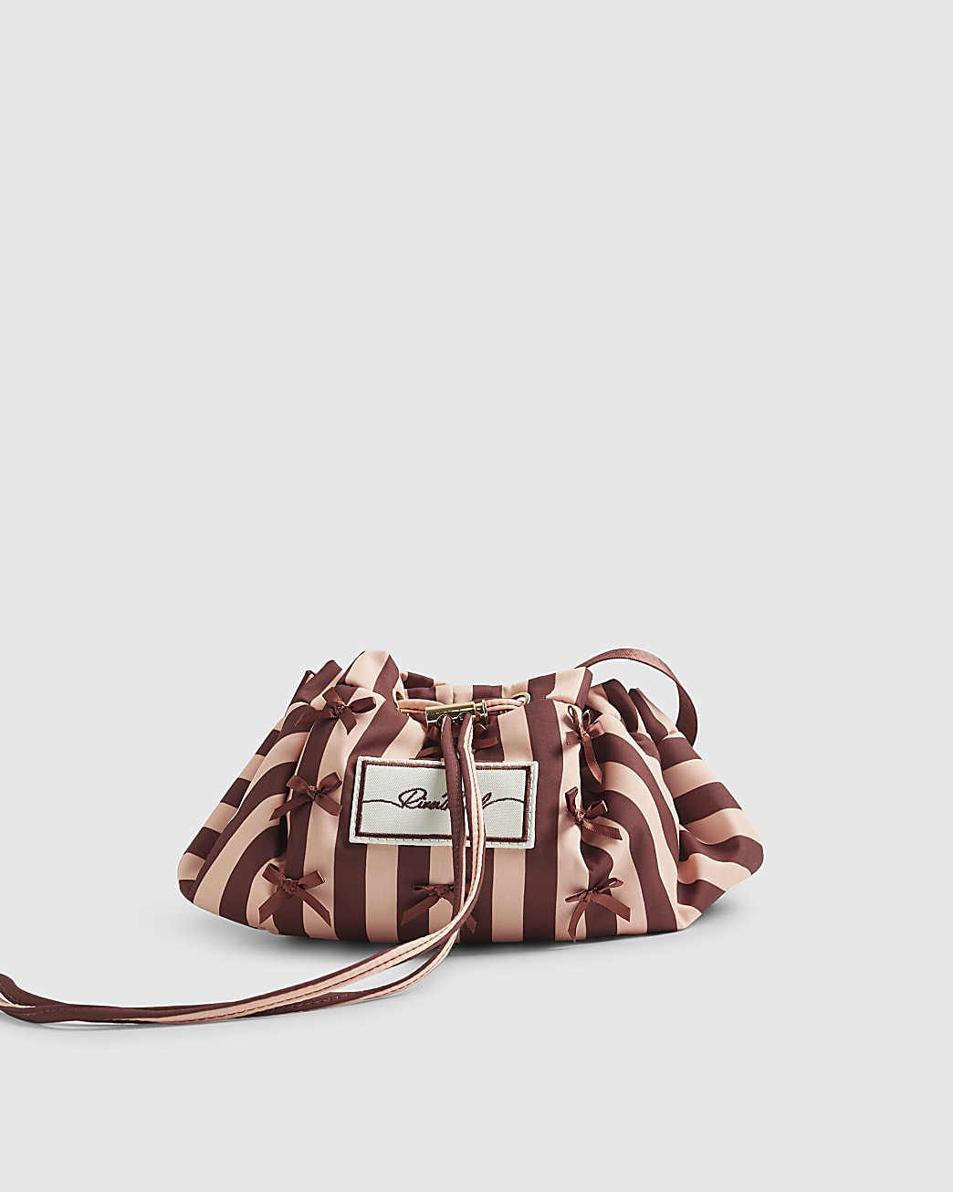 Pink Bow Stripe Drawstring Makeup Bag | River Island UK & IE