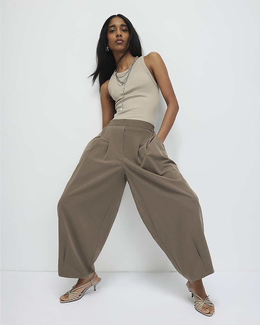 Beige Tailored Balloon Leg Trousers | River Island UK & IE