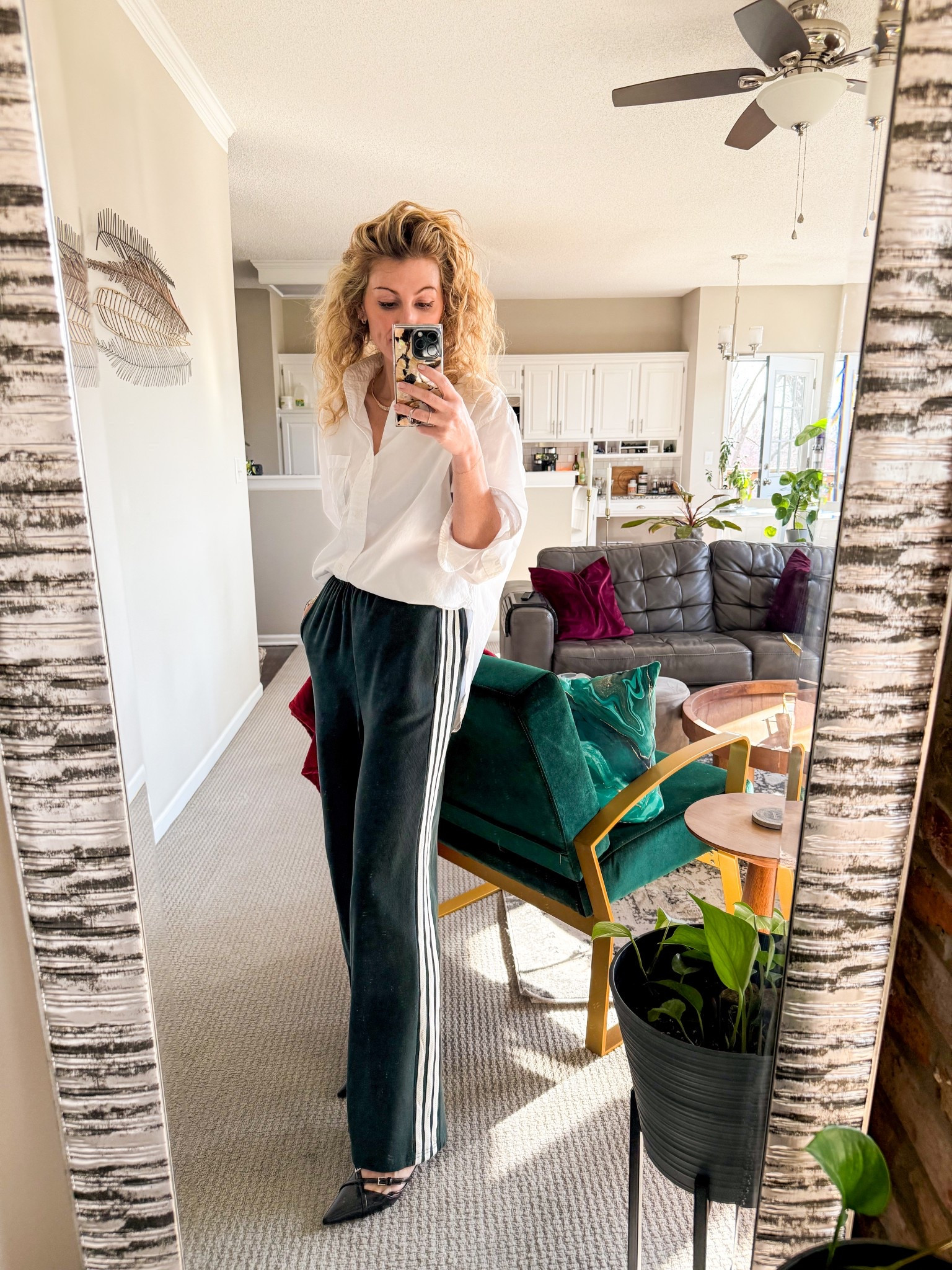 Knit track pants for the office with a pointed-toe kitten heel and a classic oversized white button-up  

#LTKWorkwear #LTKFindsUnder50 #LTKStyleTip
