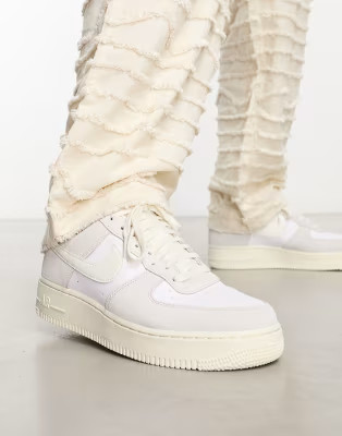 Nike Air Force 1  LV8 trainers in white and sail | ASOS (Global)