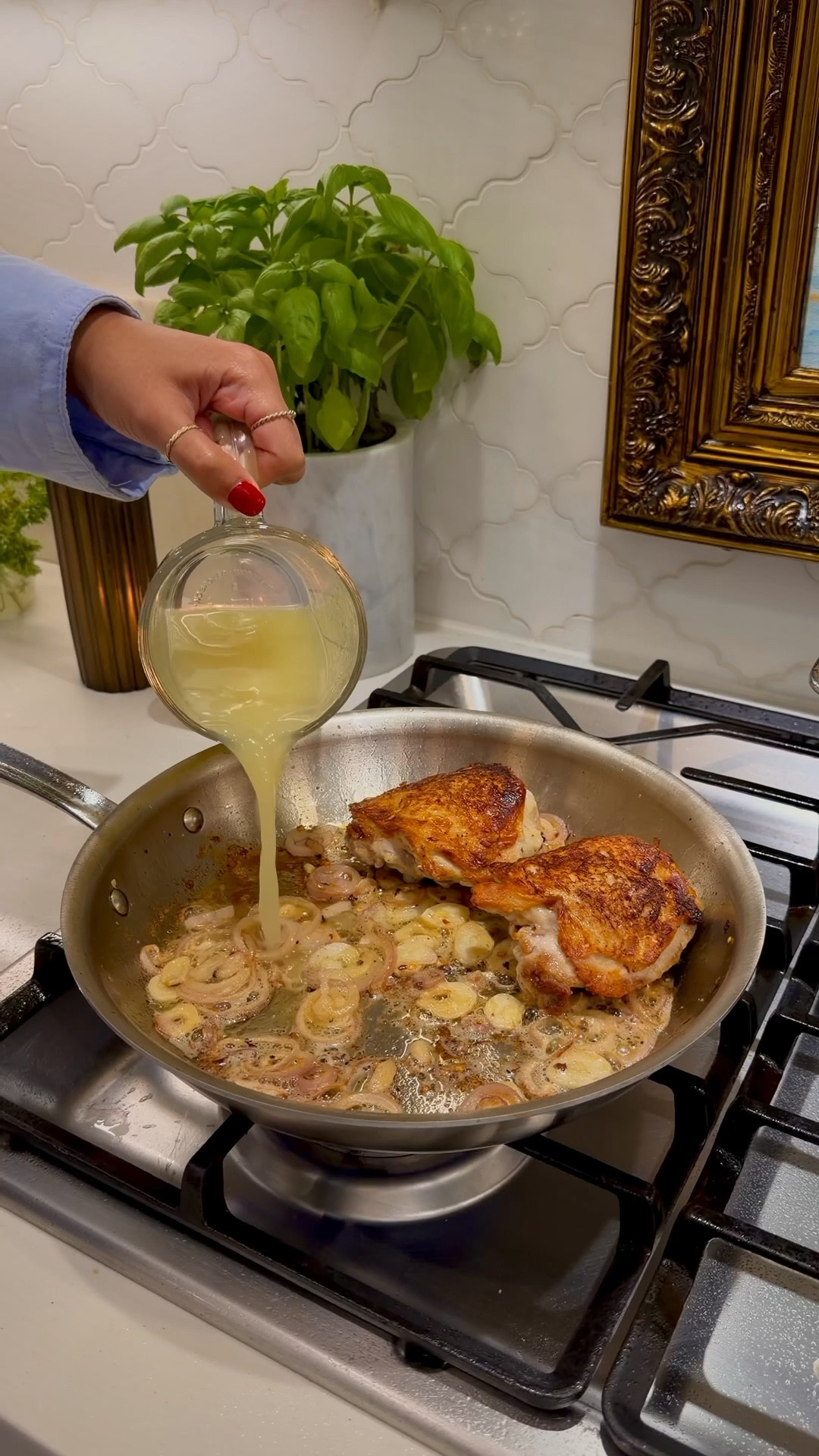 #CratePartner Not only are @allcald stainless steel pans built to last but they do the best job at crisping up chicken thighs! This is the D3 Curated Line and it is exclusively available @crateandbarrel

#AllClad #BuilttoOutlast

LEMON BUTTER CHICKEN THIGHS WITH SPAGHETTI 🍋🧄
Ingredients
✨2-4 bone-in, skin-on chicken thighs
✨3 cloves garlic, thinly sliced
✨1 shallot, thinly sliced
✨2 tablespoons unsalted butter (divided)
✨1 cup chicken stock (made with Better Than Bouillon)
✨Zest of 1 lemon
✨Juice of ½ lemon
✨Pinch of red chili flakes
✨1 teaspoon Dijon mustard
✨2 tablespoons heavy cream
✨2 Tablespoons crème fresh 
✨8 ounces spaghetti (about half a box)
✨2 pats cold butter
✨Parmesan cheese, for topping
✨Salt & pepper, to taste

Instructions
	1.	Make sure to pat dry the chicken really well. Place chicken thighs skin-side down in a cold stainless steel pan. Turn heat to medium and let the fat slowly render until the skin is deep golden and crispy, about 10–12 minutes. You’ll no it’s ready to be flipped because it’ll easily release from the pan.
	2.	Flip and sear the other side for 4–5 minutes, then season with salt and pepper.
	3.	Add garlic, shallots, 1 tablespoon butter, and red chili flakes. Sauté until shallots turn translucent.
	4.	Stir in chicken stock, lemon zest, and lemon juice.
	5.	Transfer the pan to a 375°F oven and bake for 15–18 minutes, or until chicken is cooked through (internal temp 165°F).
	6.	Remove chicken and set aside. Place the pan back on the stove and turn heat to low.
	7.	Whisk in Dijon mustard, heavy cream, crème fraîche, and 1–2 pats cold butter until the sauce thickens.
	8.	Add cooked al dente spaghetti and toss until well coated.
	9.	Plate the pasta, top with chicken, and finish with grated Parmesan and a squeeze of lemon.


#LTKHome