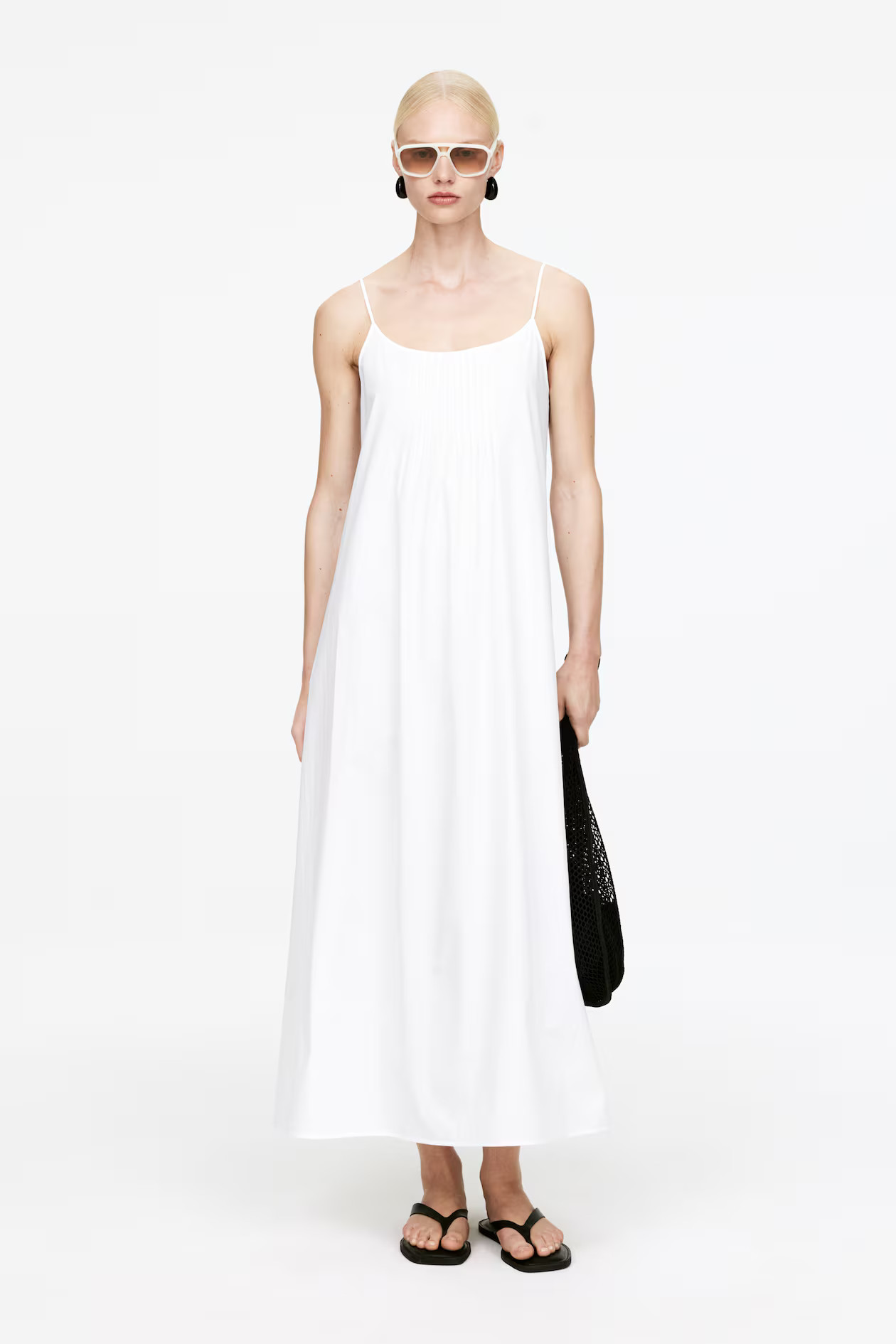 Jurk met striksluiting aan de achterkant | H&M (DE, AT, CH, NL, FI)