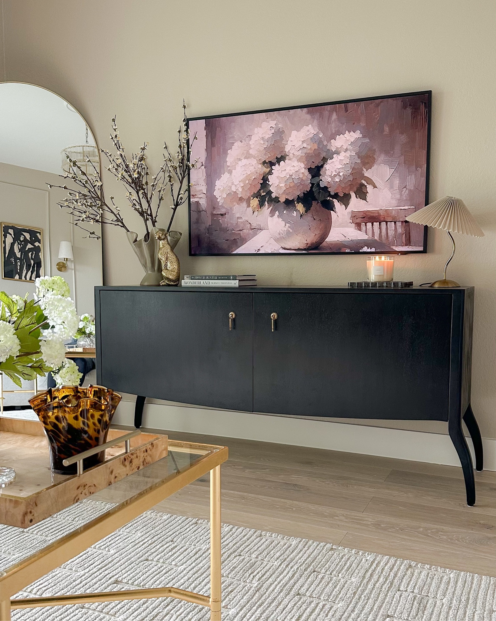 TV console styled with 55” Frame above and decor in our lounge room! 

#LTKhome #LTKstyletip #LTKfindsunder50