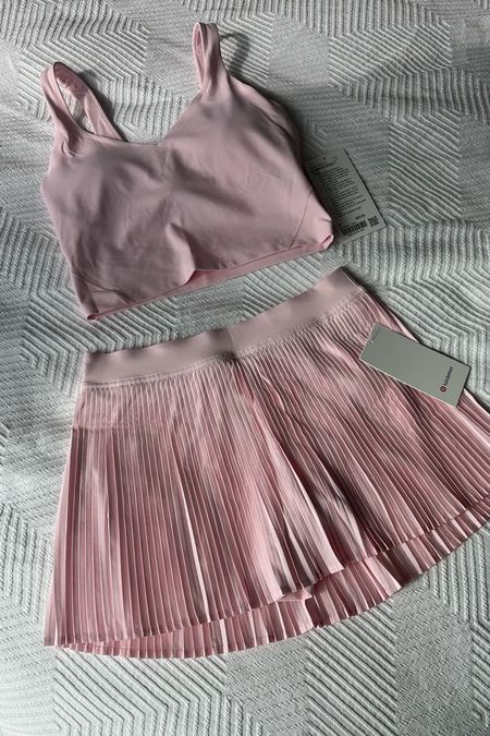 The cutest ballerina workout set 🩰🌸 from lululemon ! This tennis skirt 🎾 has adorable pleats and the align tank is so comfy! Love this shade of light pink! 

#LTKfitness #LTKfindsunder100 #LTKSeasonal