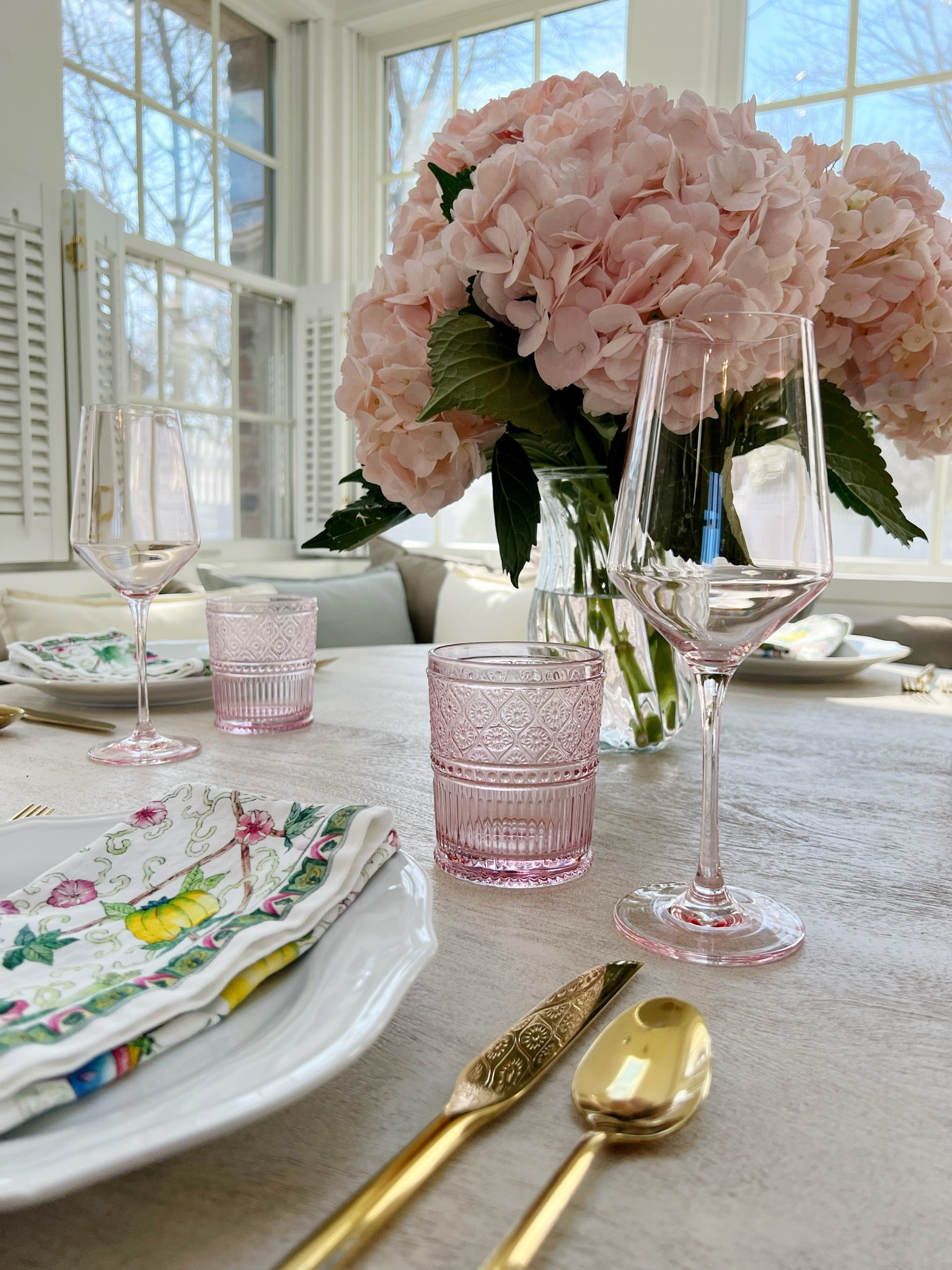 Williams Sonoma napkins, target flatware, home goods glasses, and florals by farm girl flowers. Spring table setting with hydrangea. 

#LTKfindsunder50 #LTKhome #LTKSeasonal