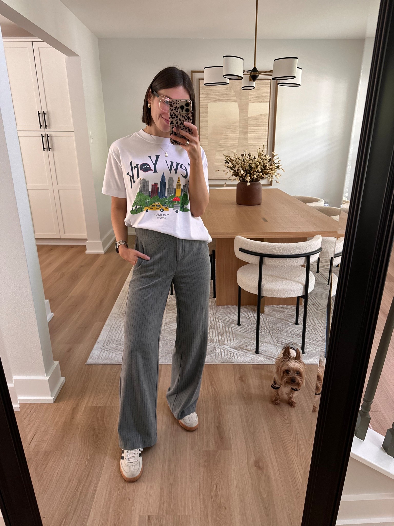 Abercrombie oversized New York City graphic tee size xs tts and the quality is nice and thick. Pinstripe trousers - I love these for dressing up or down (mostly smart casual). They’re also great for travel and don’t wrinkle. Adidas sneakers size down half or even a whole size. I sized down one 

Smart casual, work from home outfit, trousers, sneakers, oversized tee, graphic tee, gold jewelry 

#LTKTravel #LTKSaleAlert #LTKootd