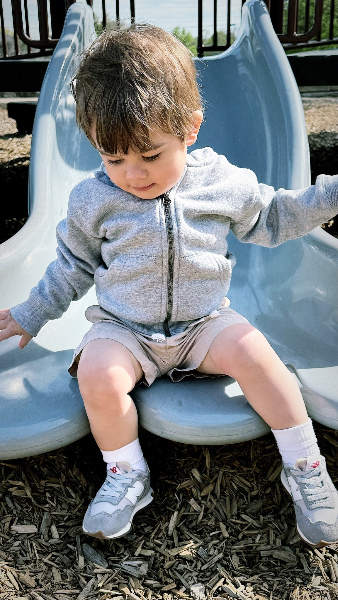 Slide chic 🛝🙂 toddler boy park outfit. P is wearing a plain white tee and khaki shorts from gap factory, simple gray zip hoodie from children’s place, and gray newbalance sneakers from nordstrom rack.

#LTKkids #LTKfindsunder50 #LTKstyletip
