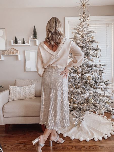 Christmas Eve Outfit
Christmas party | holiday look | sequins | heels | white tree 

#LTKSeasonal #LTKsalealert #LTKHoliday