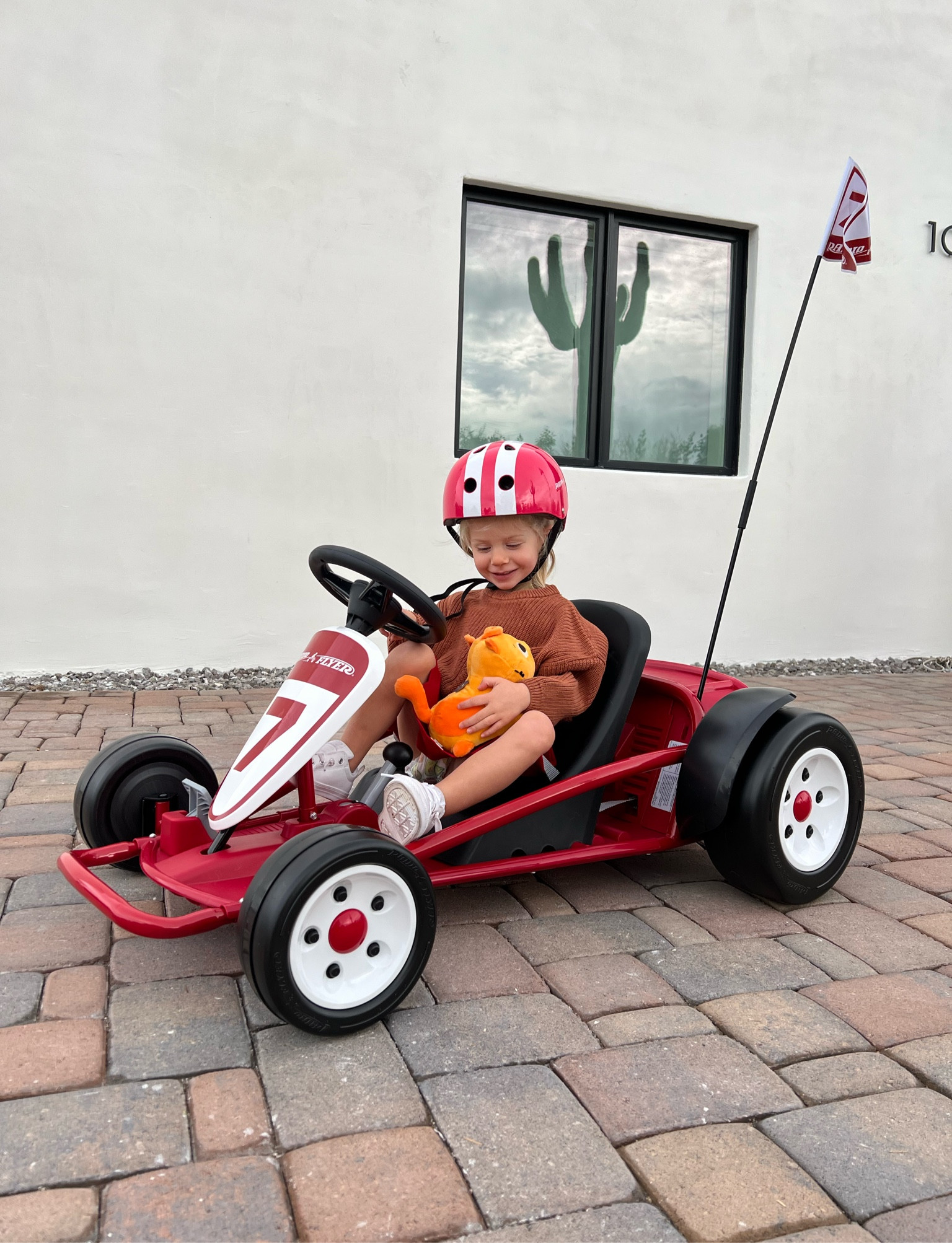 Alessi’s go kart! Electric motor with 3 speeds. We got it for Alessi when she was 2 and absolutely loves it! Made by radio flyer and is for ages 3-8.
