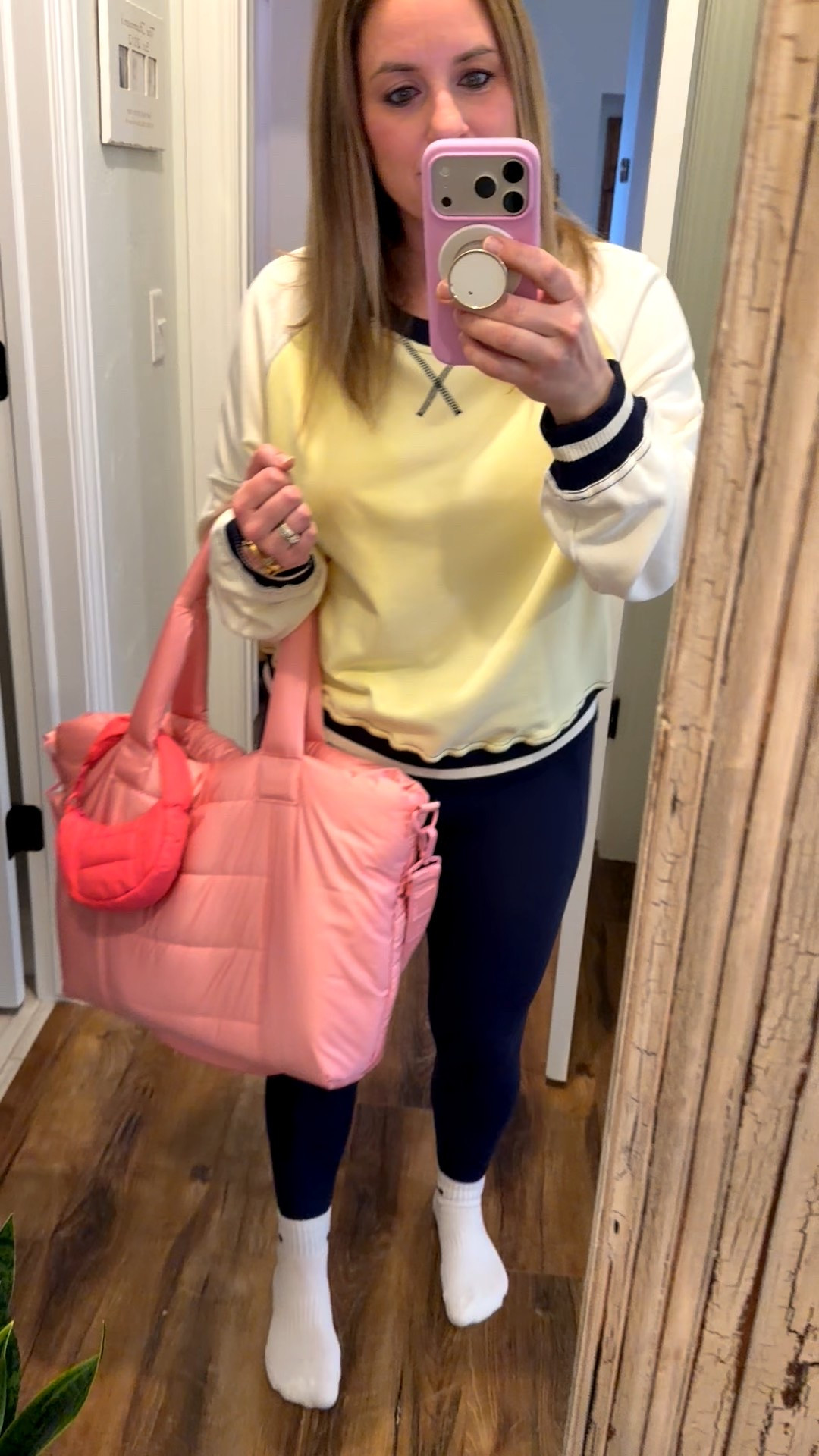 Headed on a road trip - hockey mom cozy outfit! This color blocked sweatshirt is from a local boutique but the rest is from @Aerie - this pink puffy bag and little bag attachment is a perfect mom catchall. My favorite pocket butter soft leggings - I have like 5 pair! 

#LTKmomlife #LTKootd #LTKOver40