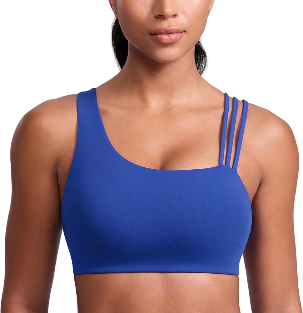 CRZ YOGA Butterlift Asymmetric Straps Sports Bras for Women - Padded Wireless Pilates Workout Gym... | Amazon (US)